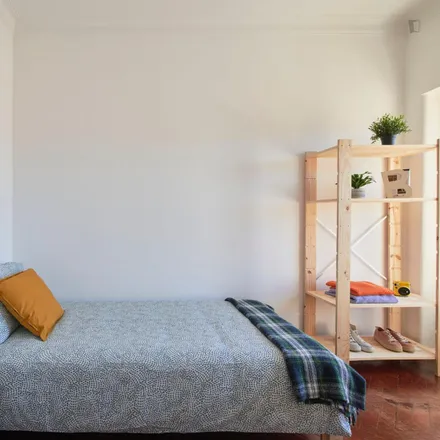 Rent this 5 bed room on Avenida Almirante Reis 93 in 1150-021 Lisbon, Portugal
