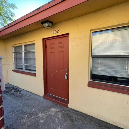 Rent this 3 bed apartment on 1803 Northwest 52nd Avenue in Lauderhill, FL 33313