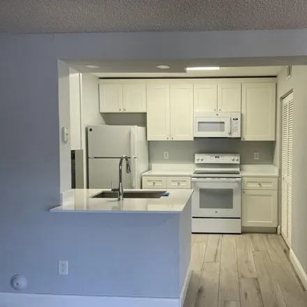 Rent this 1 bed apartment on 4045 W Mcnab Rd Apt G102 in Pompano Beach, Florida