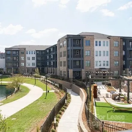 Rent this 2 bed apartment on The Shoppes at University Place in 6010 Jasmine Lane, Charlotte