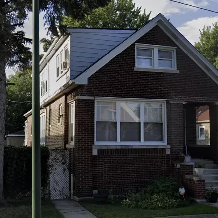 Rent this 3 bed house on 1215 E 71st Pl