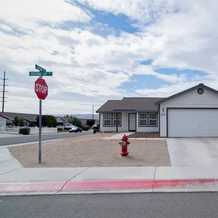 Buy this 4 bed house on 1699 Round Up Road in Fernley, NV 89408