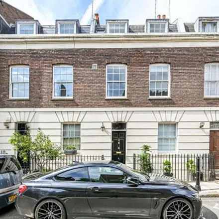 Buy this 4 bed townhouse on 21 Saint Michael's Street in London, W2 1RB