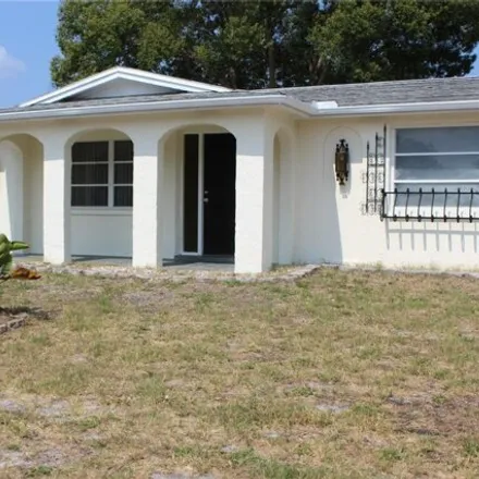 Rent this 2 bed house on 9189 Hermitage Lane in Jasmine Estates, FL 34668