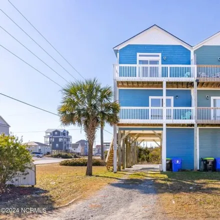 Buy this 4 bed townhouse on 2886 Island Drive in Ocean City Beach, North Topsail Beach