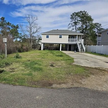 Rent this 3 bed house on 5048 Florida Street in Bay Saint Louis, MS 39520