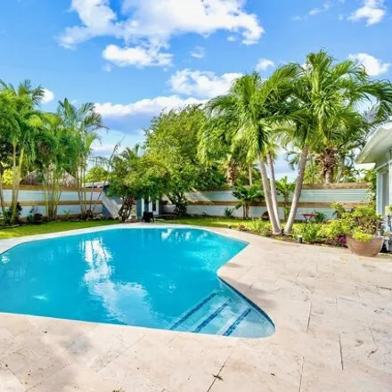 Rent this 4 bed house on 282 Northeast 28th Road in Harbor East, Boca Raton