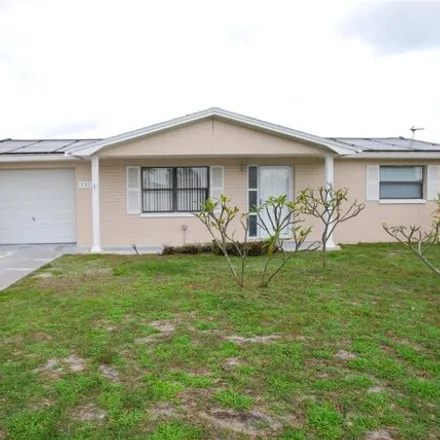 Buy this 2 bed house on 7317 Heath Drive in Jasmine Estates, FL 34668