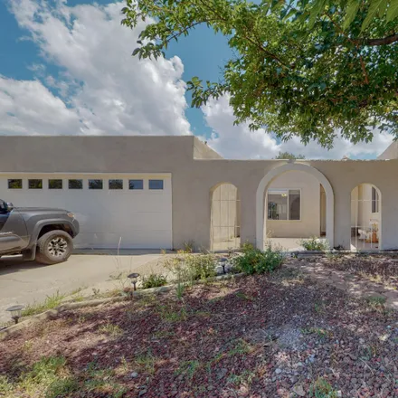 Buy this 4 bed house on 4820 Yucatan Drive Northeast in Albuquerque, NM 87111