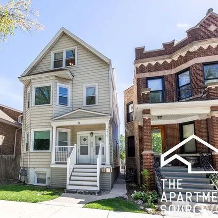 Rent this 2 bed apartment on 3917 N St Louis Ave