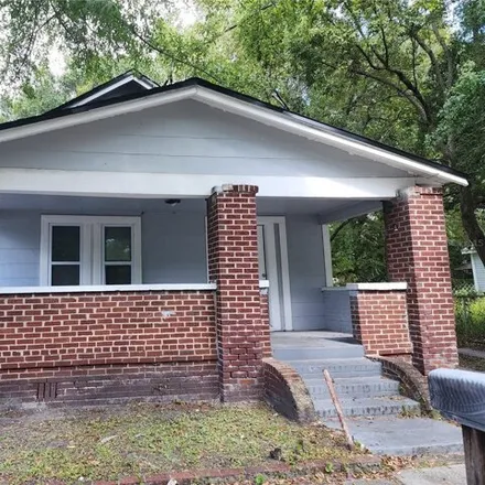 Rent this 4 bed house on 1557 Logan Street in Jacksonville, FL 32209