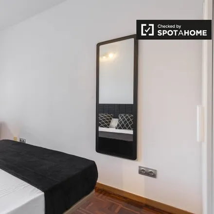 Rent this 9 bed room on Madrid in Calle de Arturo Soria, 161