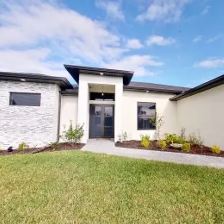 Rent this 4 bed apartment on 2421 Southwest 2Nd Ter in Burnt Store, Cape Coral
