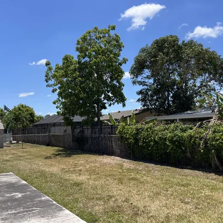 Rent this 3 bed apartment on 7474 Woodmont Terrace in Tamarac, FL 33321