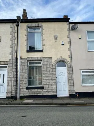 Rent this 2 bed townhouse on Mersey Road in Widnes, WA8 0DG