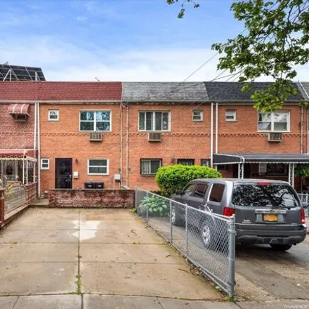 Buy this 3 bed townhouse on 1027 Hendrix Street in New York, NY 11207