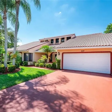 Rent this 4 bed house on Woodmont Country Club in 7801 Northwest 80th Avenue, Tamarac