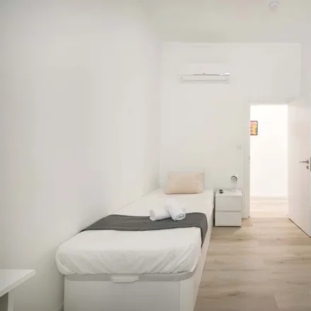 Rent this 7 bed room on Rua Quirino da Fonseca 6 in 1000-047 Lisbon, Portugal