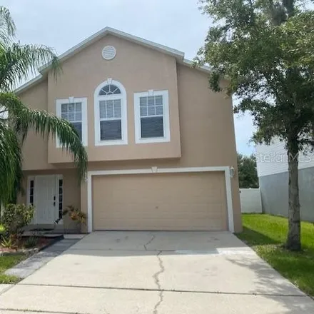 Rent this 4 bed house on 10701 Opus Drive in Riverview, FL 33569