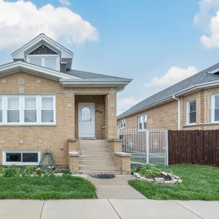 Buy this 4 bed house on 7934 West Elmgrove Drive in Elmwood Park, IL 60707
