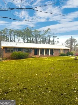 Buy this 4 bed house on 2575 Young Road in Redan, GA 30088