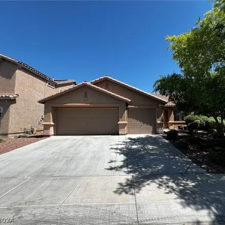 Rent this 4 bed house on 2128 Mistle Thrust Drive in North Las Vegas, NV 89084