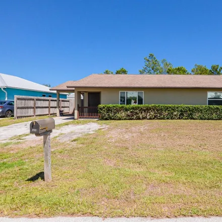 Buy this 3 bed house on 5529 Southeast Grafton Avenue in Martin County, FL 34997