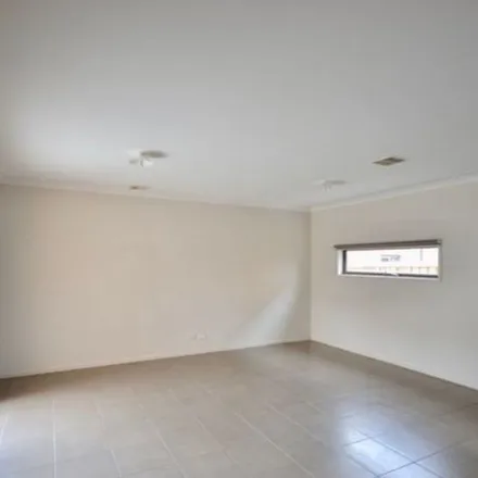 Rent this 4 bed townhouse on Jolly Street in Cranbourne East VIC 3977, Australia