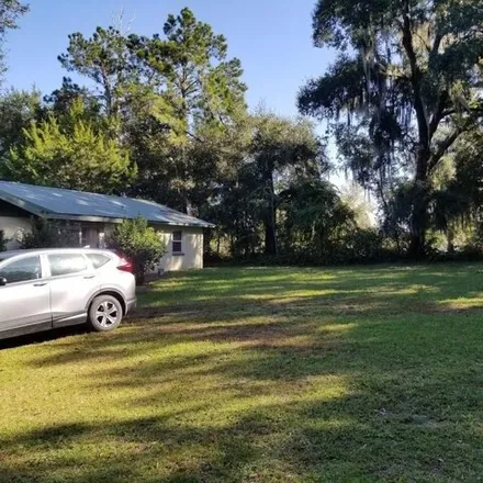 Buy this 2 bed house on 11018 Southeast 47th Avenue in Marion County, FL 34420