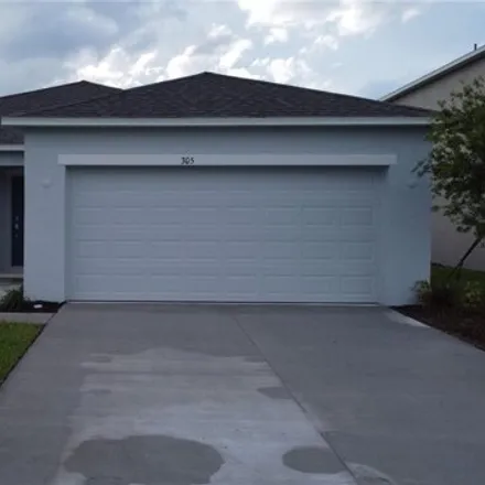 Rent this 3 bed house on Pine Tree Bridge Trail in Saint Cloud, FL 34772