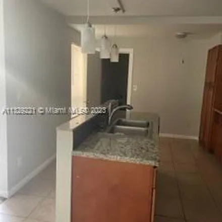 Rent this 3 bed apartment on 20626 Northeast 7th Court in Miami-Dade County, FL 33179