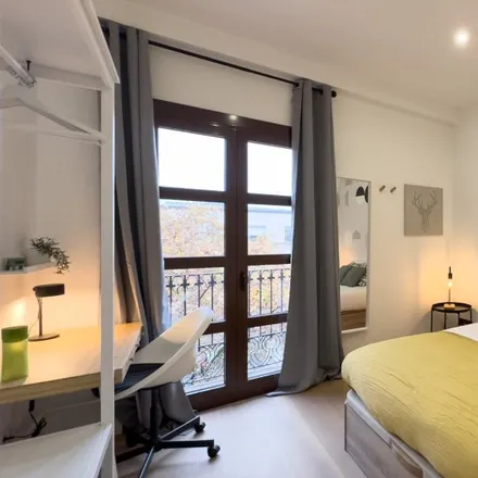 Rent this 5 bed room on Carrer de l'Hospital in 4, 08001 Barcelona