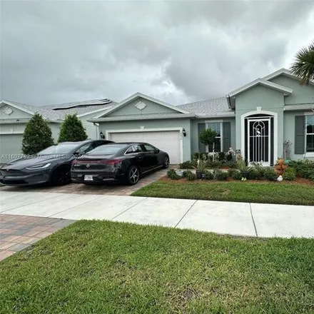 Buy this 5 bed house on 10479 SW Captiva Dr in Port Saint Lucie, Florida