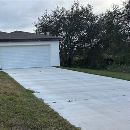 Buy this 4 bed house on 3109 57th St W in Lehigh Acres, Florida