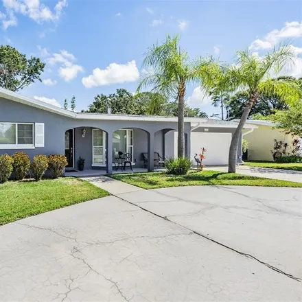 Buy this 3 bed house on Harbor Hill Parkway in Palm Harbor, FL 34695