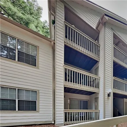 Buy this 2 bed condo on Churchill Downs Court in Charlotte, NC 28211