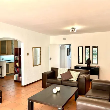 Rent this 3 bed townhouse on Benmore Gardens in Grayston Drive, Sandton