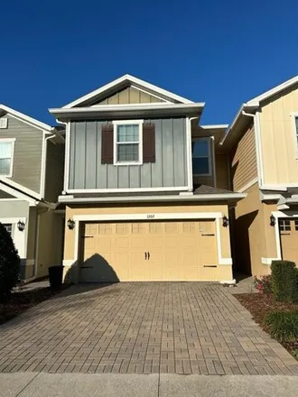 Rent this 3 bed townhouse on East Tenth Street in Orange County, FL 32703