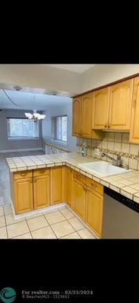 Rent this 2 bed house on 230 Wimbledon Lakes Drive in Plantation, FL 33324
