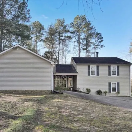 Buy this 4 bed house on 5151 Post Road Pass in Redan, GA 30088