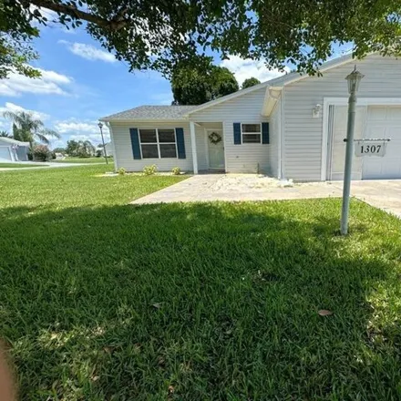 Rent this 2 bed house on 1307 Tenerife Lane in The Villages, FL 32162