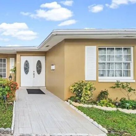 Buy this 2 bed house on 2140 Northwest 32nd Terrace in Lauderdale Lakes, FL 33311