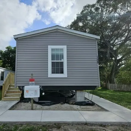 Buy this studio apartment on 16th Court North in Palm Beach County, FL 33417