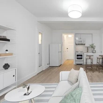 Buy this studio apartment on Woodstock Tower in 320 East 42nd Street, New York