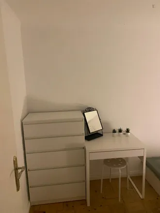 Rent this 3 bed room on Rua Acúrsio Pereira in 1800-328 Lisbon, Portugal