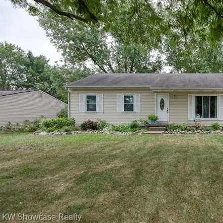 Buy this 4 bed house on 707 Los Arboles Drive in Wolverine Lake, Commerce Township