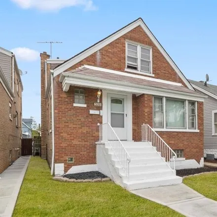 Buy this 4 bed house on 6325 South Kolin Avenue in Chicago, IL 60629