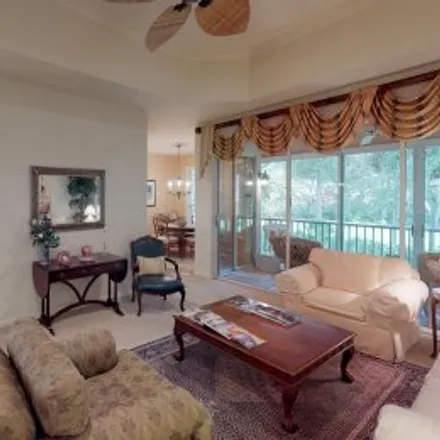 Rent this 3 bed apartment on #1821,8460 Abbington Circle in The Crescent at Pelican Bay Condominiums, Naples
