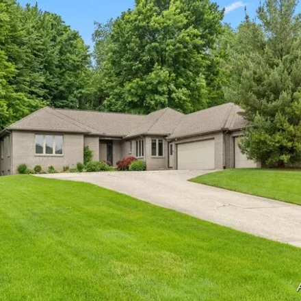 Buy this 4 bed house on Valencia Drive Northeast in Cannon Township, MI 49341