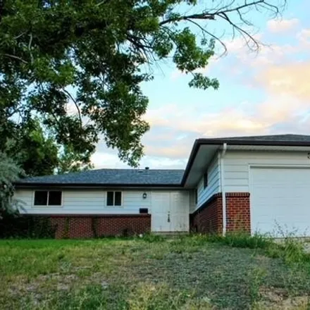Buy this 3 bed house on 3052 South Xenia Court in Denver, CO 80231